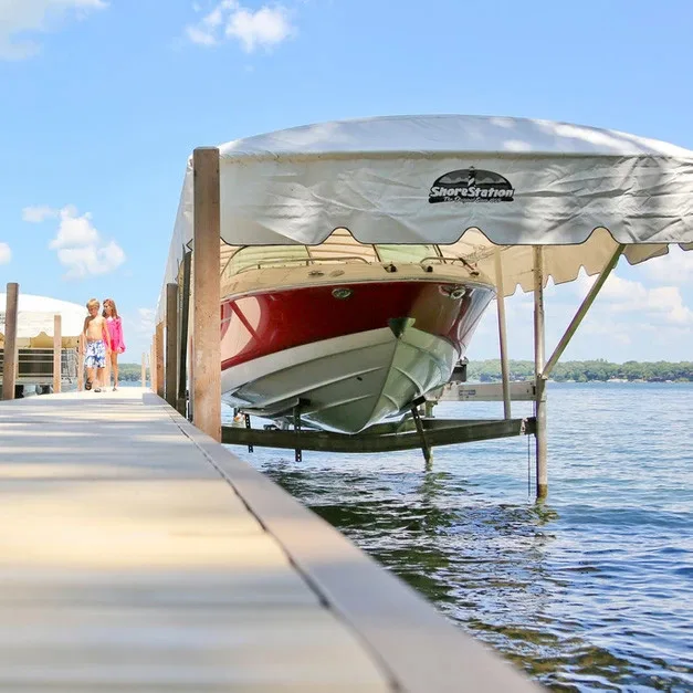 Boat secured in a ShoreStation boat lift